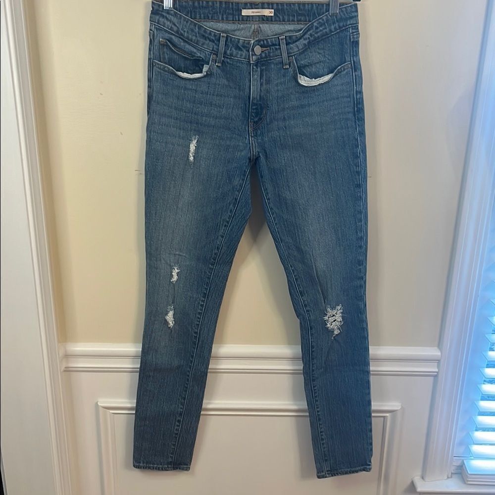 Levi’s 711 Distressed Skinny Jeans
